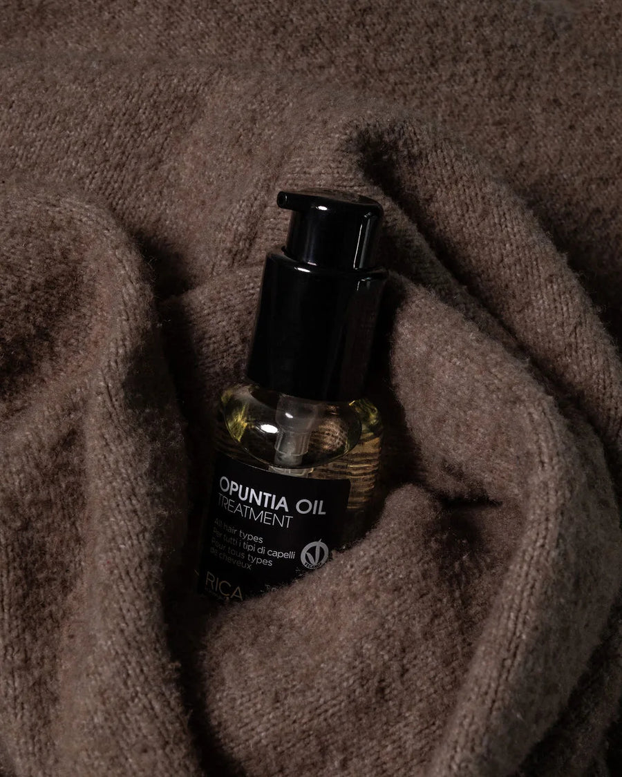 Moda Salon Rica Opuntia Oil treatment on a knit sweater