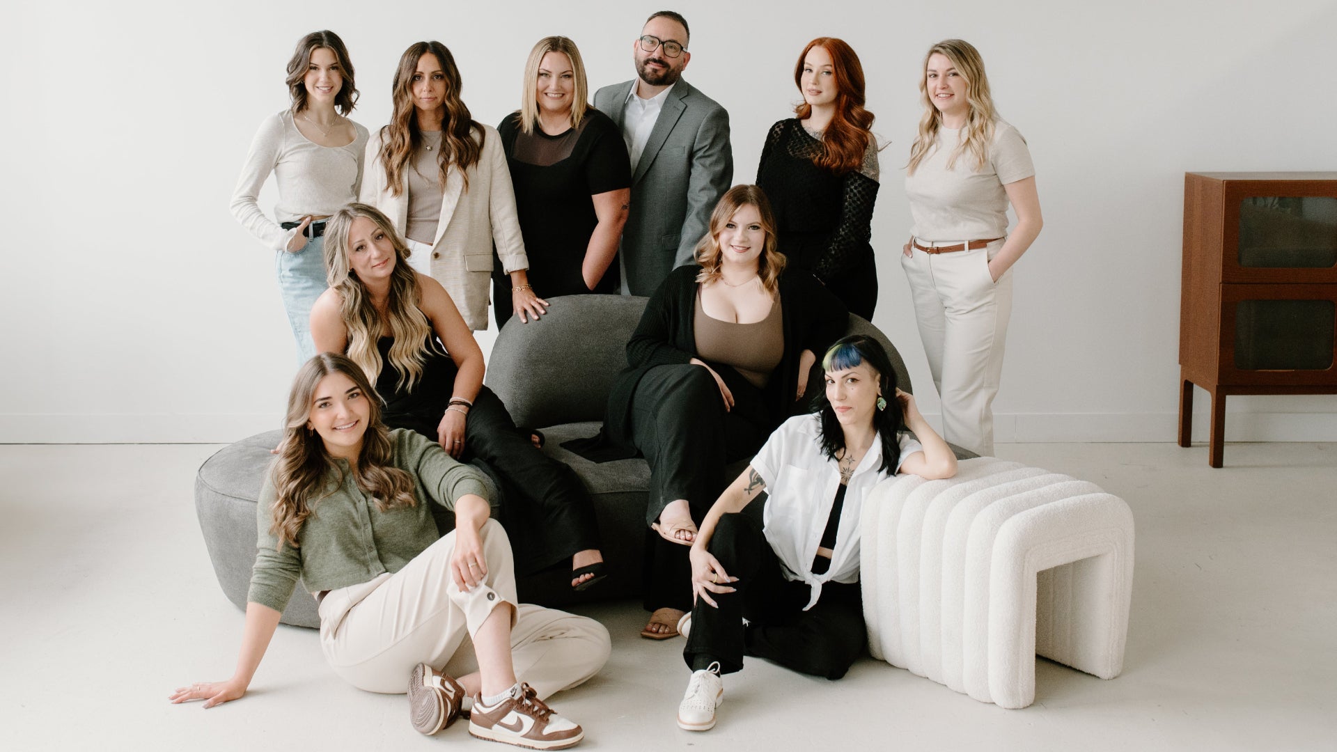 group of team members posed on couch