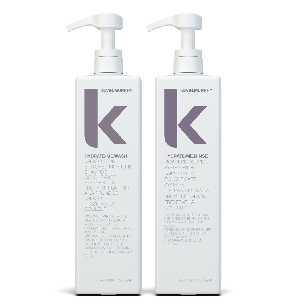 Two bottles of Kevin Murphy haircare products, one labeled 'HYDRATE-ME.WASH' and the other 'HYDRATE-ME.