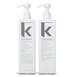 Two bottles of Kevin Murphy haircare products, one labeled 'HYDRATE-ME.WASH' and the other 'HYDRATE-ME.