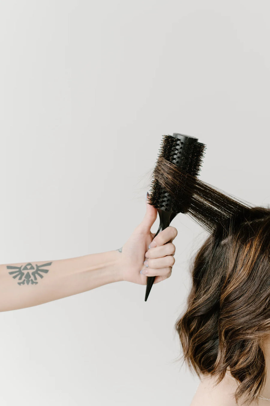 Moda Salon round-brush brunette blowout