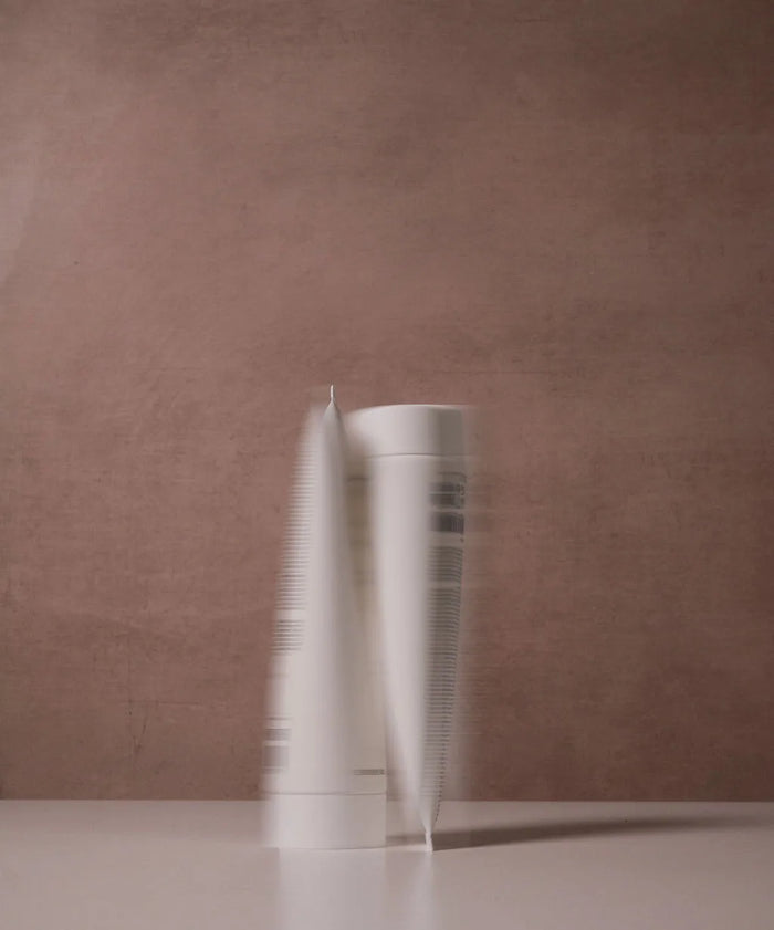 Moda Salon white product tubes stacked, creative
