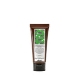 Tube of Davines hair care product on a white background